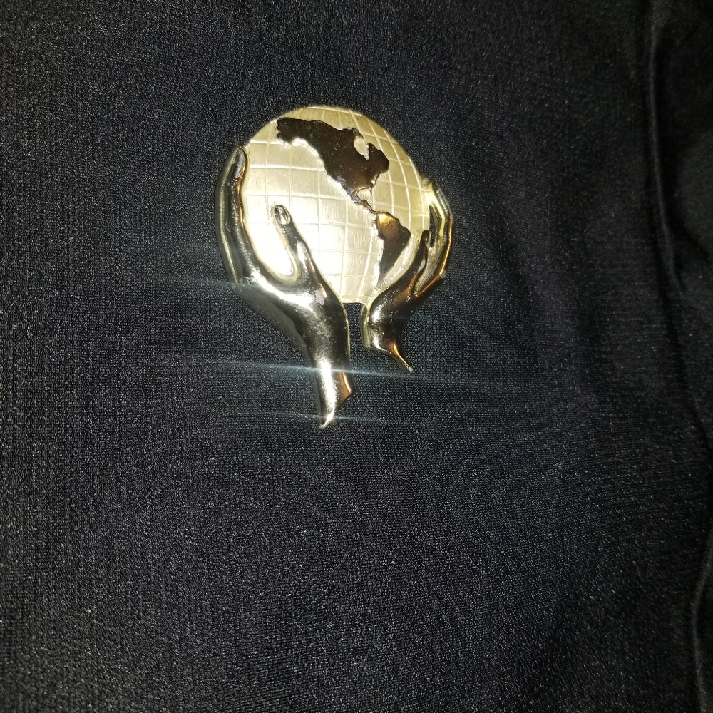 Gold tone Hands Holding Globe World pin Broach